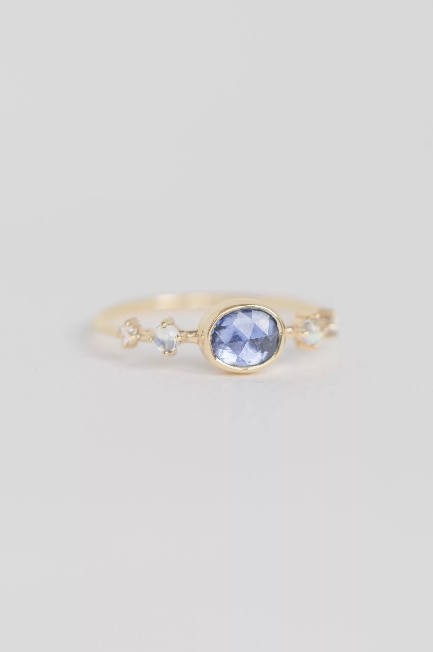 Yellow gold blue freeform sapphire round moonstones rosecut diamonds ring Celine Daoust
