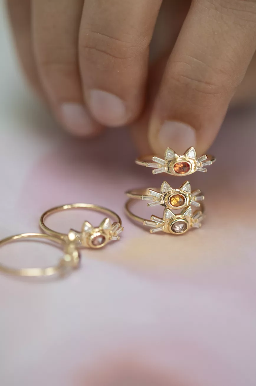 Yellow gold ring oval light pink tourmaline cat ear baguette diamond motif Celine Daoust